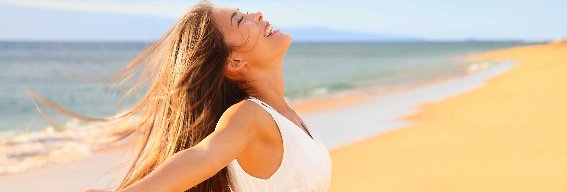 Woman on beach enjoying nature